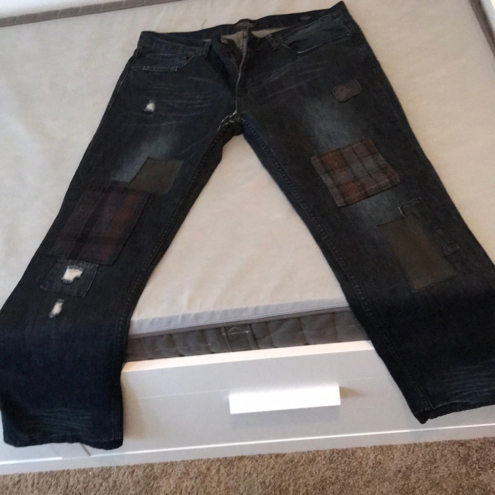 Jeans - like new but has a tear